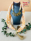 Scarf Styled with Pendant Necklace